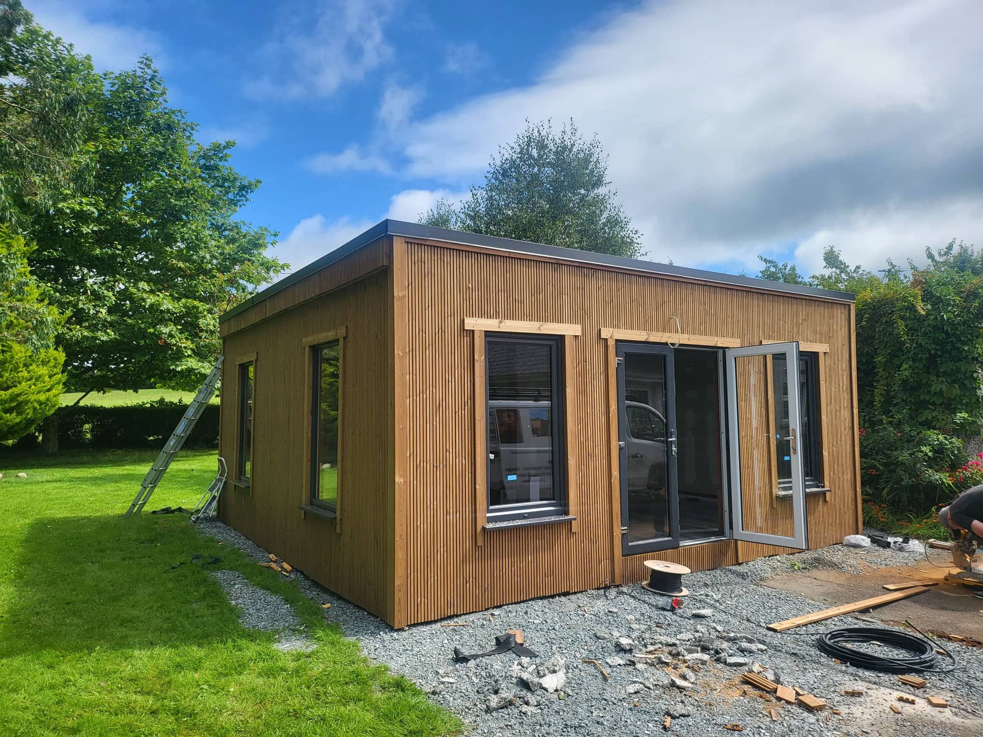 image of a log cabin in a garden